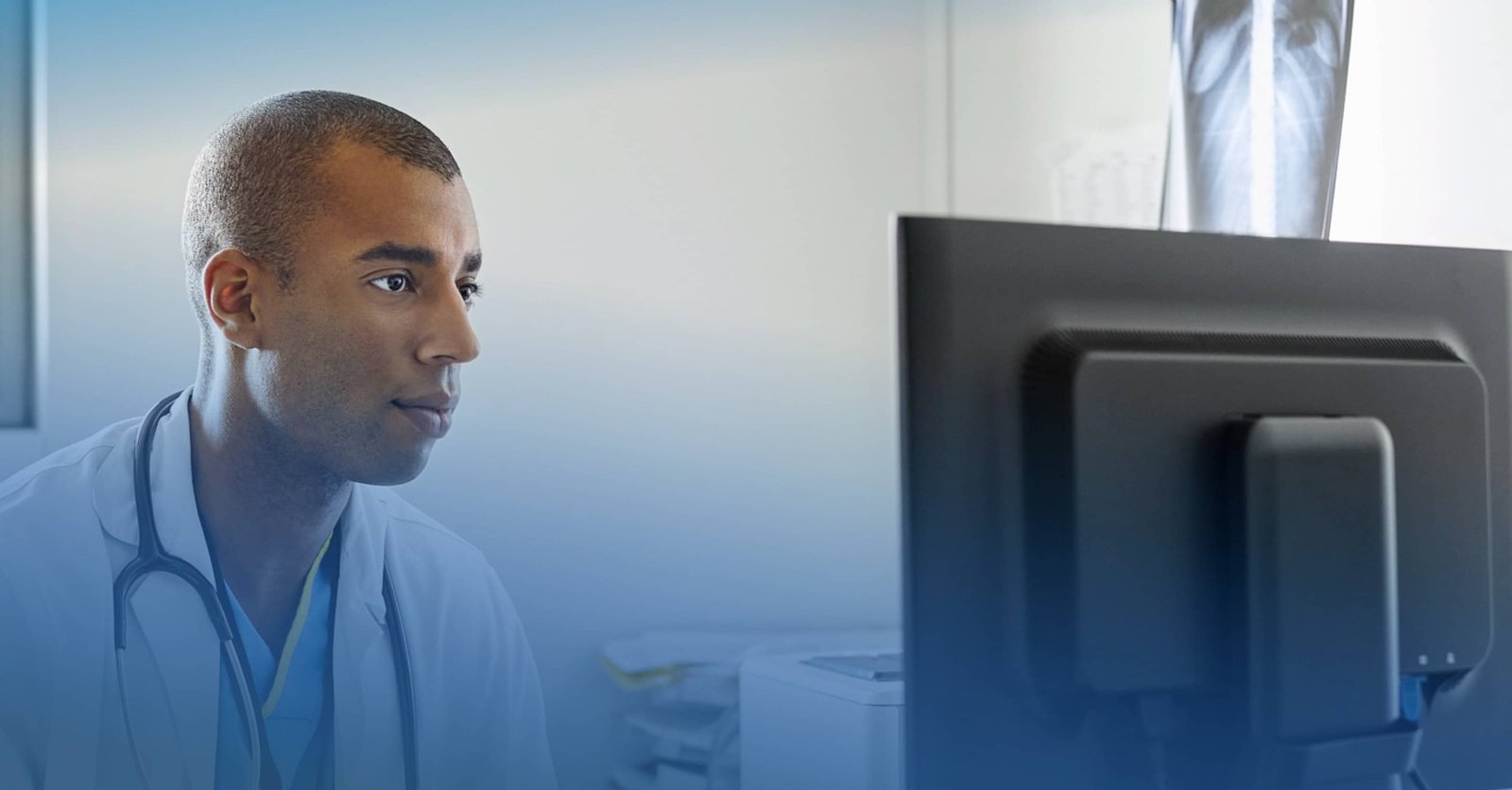 Healthcare professional intently watching something